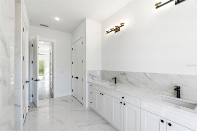 Welcome to this luxurious, modern, custom-built home perfectly on Rotonda Golf and Country Club - Long Marsh  in Florida - for sale on GolfHomes.com, golf home, golf lot