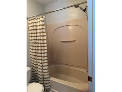 This Beautiful, Move-In-Ready Colonial Townhouse features many on Evergreen Hills Golf Course in Michigan - for sale on GolfHomes.com, golf home, golf lot