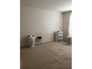 This Beautiful, Move-In-Ready Colonial Townhouse features many on Evergreen Hills Golf Course in Michigan - for sale on GolfHomes.com, golf home, golf lot