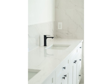 Welcome to this modern, custom-built home perfectly situated on on Rotonda Golf and Country Club - Long Marsh  in Florida - for sale on GolfHomes.com, golf home, golf lot