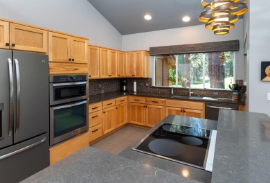 Escape to this tranquil 2-story townhome in a gated community on Widgi Creek Golf Club in Oregon - for sale on GolfHomes.com, golf home, golf lot