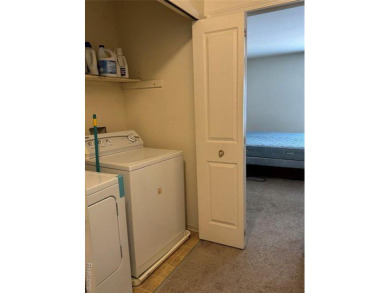 This Beautiful, Move-In-Ready Colonial Townhouse features many on Evergreen Hills Golf Course in Michigan - for sale on GolfHomes.com, golf home, golf lot