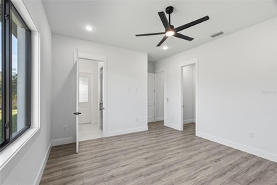 Welcome to this modern, custom-built home perfectly situated on on Rotonda Golf and Country Club - Long Marsh  in Florida - for sale on GolfHomes.com, golf home, golf lot