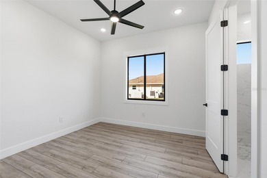 Welcome to this modern, custom-built home perfectly situated on on Rotonda Golf and Country Club - Long Marsh  in Florida - for sale on GolfHomes.com, golf home, golf lot