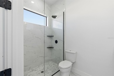 Welcome to this modern, custom-built home perfectly situated on on Rotonda Golf and Country Club - Long Marsh  in Florida - for sale on GolfHomes.com, golf home, golf lot