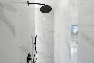 Welcome to this modern, custom-built home perfectly situated on on Rotonda Golf and Country Club - Long Marsh  in Florida - for sale on GolfHomes.com, golf home, golf lot