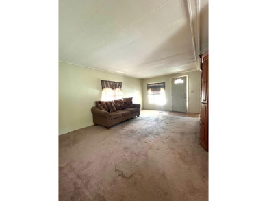 Welcome to this beautiful home move-in ready, in pet section on Spanish Lakes Golf Village in Florida - for sale on GolfHomes.com, golf home, golf lot