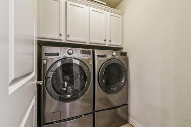 Beautifully maintained one-story home nestled in the on Frisco Lakes Golf Course in Texas - for sale on GolfHomes.com, golf home, golf lot