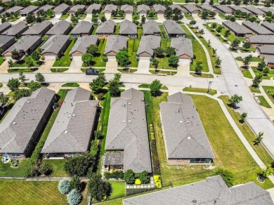 Beautifully maintained one-story home nestled in the on Frisco Lakes Golf Course in Texas - for sale on GolfHomes.com, golf home, golf lot