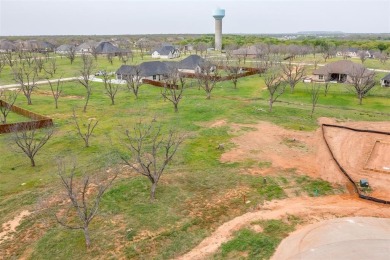 Howdy! Build your dream home on this beautiful pie-shaped lot on Pecan Plantation Country Club in Texas - for sale on GolfHomes.com, golf home, golf lot