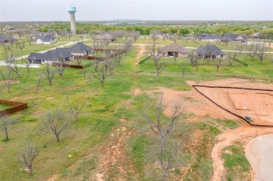Howdy! Build your dream home on this beautiful pie-shaped lot on Pecan Plantation Country Club in Texas - for sale on GolfHomes.com, golf home, golf lot