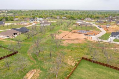 Howdy! Build your dream home on this beautiful pie-shaped lot on Pecan Plantation Country Club in Texas - for sale on GolfHomes.com, golf home, golf lot
