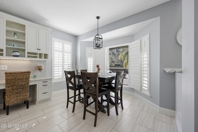 Thoughtfully updated POOL HOME designed for indoor-outdoor on Golf Club At South Hampton in Florida - for sale on GolfHomes.com, golf home, golf lot