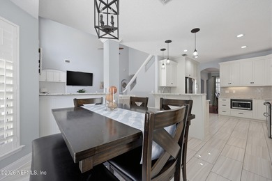 Thoughtfully updated POOL HOME designed for indoor-outdoor on Golf Club At South Hampton in Florida - for sale on GolfHomes.com, golf home, golf lot