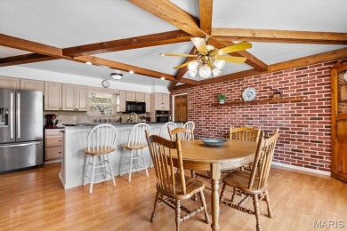 Discover your dream home at this stunning waterfront oasis on Tamarack Country Club in Illinois - for sale on GolfHomes.com, golf home, golf lot