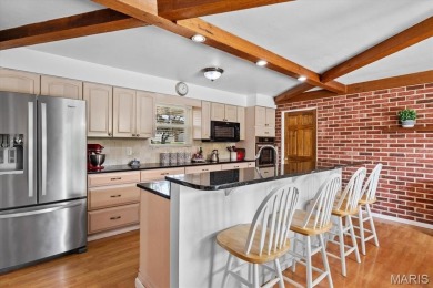 Discover your dream home at this stunning waterfront oasis on Tamarack Country Club in Illinois - for sale on GolfHomes.com, golf home, golf lot