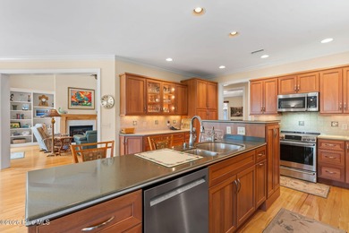 This custom-built all brick home is beautifully positioned along on Members Club At St. James Plantation in North Carolina - for sale on GolfHomes.com, golf home, golf lot