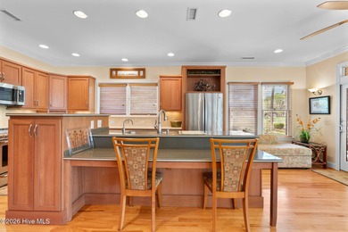 This custom-built all brick home is beautifully positioned along on Members Club At St. James Plantation in North Carolina - for sale on GolfHomes.com, golf home, golf lot