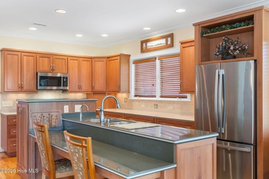 This custom-built all brick home is beautifully positioned along on Members Club At St. James Plantation in North Carolina - for sale on GolfHomes.com, golf home, golf lot