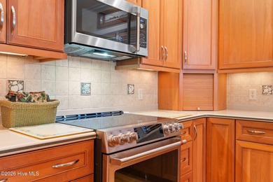 This custom-built all brick home is beautifully positioned along on Members Club At St. James Plantation in North Carolina - for sale on GolfHomes.com, golf home, golf lot