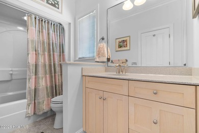 This custom-built all brick home is beautifully positioned along on Members Club At St. James Plantation in North Carolina - for sale on GolfHomes.com, golf home, golf lot