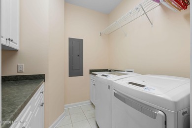 This custom-built all brick home is beautifully positioned along on Members Club At St. James Plantation in North Carolina - for sale on GolfHomes.com, golf home, golf lot