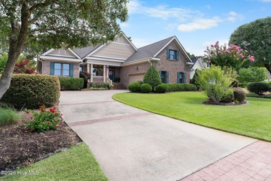 This custom-built all brick home is beautifully positioned along on Members Club At St. James Plantation in North Carolina - for sale on GolfHomes.com, golf home, golf lot