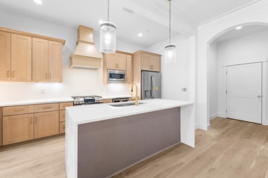 Discover the epitome of upscale living at the Townhomes at the on Sharks Tooth Golf Club in Florida - for sale on GolfHomes.com, golf home, golf lot