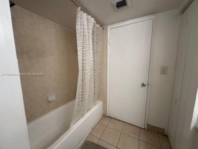 SPACIOUS BRIGHT 2 BEDROOM 2 BATHROOM AT THE GREENS AT DORAL on Jim McLean Signature Course in Florida - for sale on GolfHomes.com, golf home, golf lot