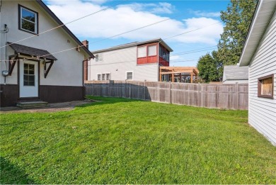 This 3-bedroom, 2-bath home features beautiful natural woodwork on Phalen Park Golf Course in Minnesota - for sale on GolfHomes.com, golf home, golf lot