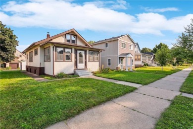 This 3-bedroom, 2-bath home features beautiful natural woodwork on Phalen Park Golf Course in Minnesota - for sale on GolfHomes.com, golf home, golf lot