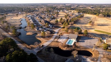 Beautiful 3BR, 2BA home overlooking the 18th tee box of the on Players Course At Wyboo Plantation in South Carolina - for sale on GolfHomes.com, golf home, golf lot