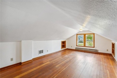 This 3-bedroom, 2-bath home features beautiful natural woodwork on Phalen Park Golf Course in Minnesota - for sale on GolfHomes.com, golf home, golf lot