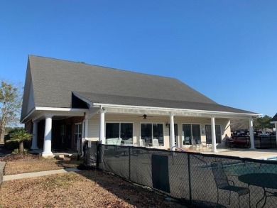 Beautiful 3BR, 2BA home overlooking the 18th tee box of the on Players Course At Wyboo Plantation in South Carolina - for sale on GolfHomes.com, golf home, golf lot