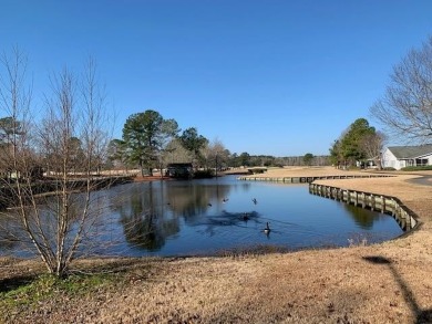 Beautiful 3BR, 2BA home overlooking the 18th tee box of the on Players Course At Wyboo Plantation in South Carolina - for sale on GolfHomes.com, golf home, golf lot