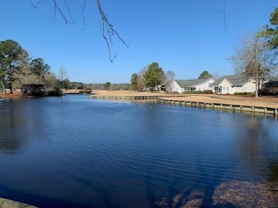 Beautiful 3BR, 2BA home overlooking the 18th tee box of the on Players Course At Wyboo Plantation in South Carolina - for sale on GolfHomes.com, golf home, golf lot