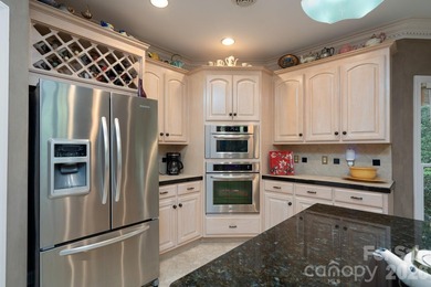 Nestled on the 6th green of The Old North State Club, 117 on Old North State Club at Uwharrie Point Golf community in North Carolina - for sale on GolfHomes.com, golf home, golf lot