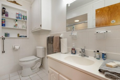 This charming 3-bedroom, 2.5-bath coastal retreat is located on Beachwood Golf Club in South Carolina - for sale on GolfHomes.com, golf home, golf lot