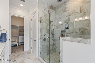 Experience waterfront living at its finest in this elegant on Pablo Creek Club in Florida - for sale on GolfHomes.com, golf home, golf lot