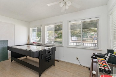This charming 3-bedroom, 2.5-bath coastal retreat is located on Beachwood Golf Club in South Carolina - for sale on GolfHomes.com, golf home, golf lot