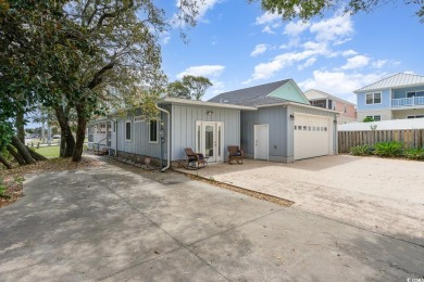 This charming 3-bedroom, 2.5-bath coastal retreat is located on Beachwood Golf Club in South Carolina - for sale on GolfHomes.com, golf home, golf lot