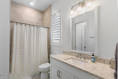 Experience waterfront living at its finest in this elegant on Pablo Creek Club in Florida - for sale on GolfHomes.com, golf home, golf lot