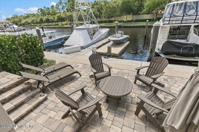 Experience waterfront living at its finest in this elegant on Pablo Creek Club in Florida - for sale on GolfHomes.com, golf home, golf lot