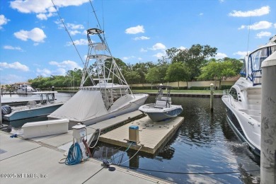Experience waterfront living at its finest in this elegant on Pablo Creek Club in Florida - for sale on GolfHomes.com, golf home, golf lot