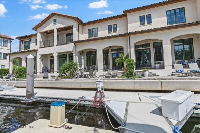 Experience waterfront living at its finest in this elegant on Pablo Creek Club in Florida - for sale on GolfHomes.com, golf home, golf lot