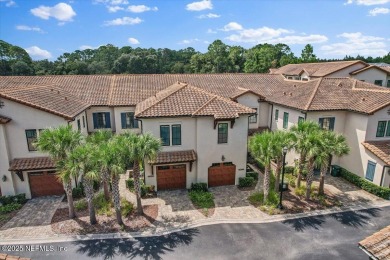 Experience waterfront living at its finest in this elegant on Pablo Creek Club in Florida - for sale on GolfHomes.com, golf home, golf lot