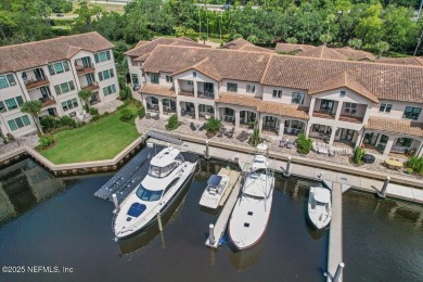 Experience waterfront living at its finest in this elegant on Pablo Creek Club in Florida - for sale on GolfHomes.com, golf home, golf lot