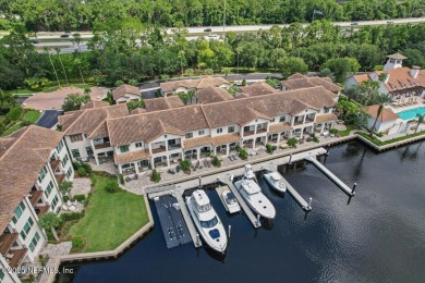 Experience waterfront living at its finest in this elegant on Pablo Creek Club in Florida - for sale on GolfHomes.com, golf home, golf lot