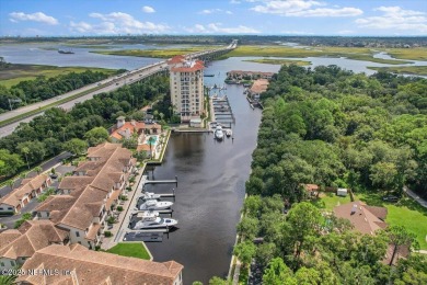Experience waterfront living at its finest in this elegant on Pablo Creek Club in Florida - for sale on GolfHomes.com, golf home, golf lot