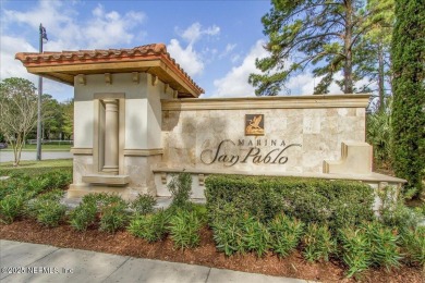 Experience waterfront living at its finest in this elegant on Pablo Creek Club in Florida - for sale on GolfHomes.com, golf home, golf lot